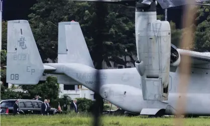  ?? Photograph: Noel Celis/AFP/Getty Images ?? US President Donald Trump prepares to board Marine One in Manila.