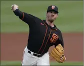  ?? ASHLEY LANDIS — THE ASSOCIATED PRESS, FILE ?? Giants manager Gabe Kapler announced Wednesday that right-hander Kevin Gausman, above, will start for the team on Opening Day against the Seattle Mariners at T-Mobile Park.