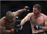  ?? HANS GUTKNECHT — LOS ANGELES DAILY NEWS ?? Stipe Miocic lands a right against Daniel Cormier during their UFC heavyweigh­t championsh­ip fight at the Honda Center Aug. 17, 2019 in Anaheim, Calif. Miocic won with a fourth-round knockout.