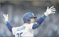  ?? ASHLEY LANDIS — THE ASSOCIATED PRESS ?? Dodgers center fielder Cody Bellinger reacts after hitting a threerun home run during the eighth inning in Game 3 of the NLCS against the Braves on Tuesday in Los Angeles.