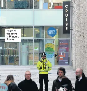  ??  ?? Police at the scene in Princess Square