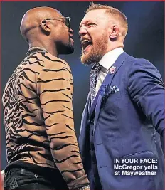  ??  ?? IN YOUR FACE: McGregor yells at Mayweather