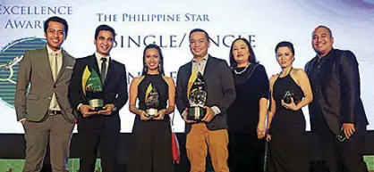  ?? Single/Single. ?? STAR EVP Lucien Dy Tioco, together with several members of his sales and marketing team, receiving the 2015 Quill Award for The STAR’s first rom-com TV series,