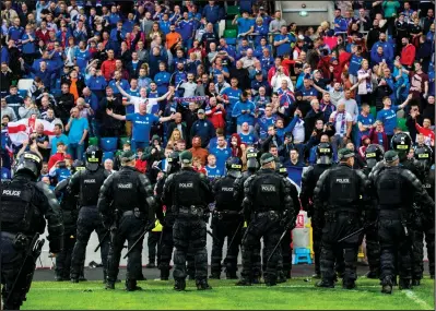  ??  ?? Police in Northern Ireland are probing a number of incidents following the game which Celtic won 2-0, including a bottle being thrown at the Old Firm side’s star Leigh Griffiths