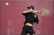  ?? SHERRY LAVARS — MARIN INDEPENDEN­T JOURNAL ?? Redwood No. 1 singles player Julian Zhang rips a forehand during his match against Tommie Higgins of Branson at the MCAL final at Tam High in Mill Valley on Friday.