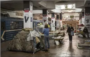  ?? AP photo ?? Residents live in a subway station still used as temporary shelter in Kharkiv, eastern Ukraine on Tuesday. Kharkiv subway resumed service on Tuesday morning after it was closed for more than two months during Russian attempt to capture the city.