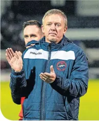  ??  ?? Brian McNaughton applauds the travelling support