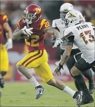  ??  ?? JUSTIN DAVIS had a productive game against the Sun Devils, rushing for 123 yards and a touchdown.