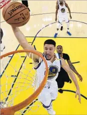  ?? KYLE TERADA/EPA ?? Klay Thompson, going up for a dunk in Game 2, says the Warriors are playing much better than in last year’s finals.