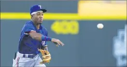  ?? Richey Miller Associated Press ?? FANS CAN buy shares in Finlete’s first player, Texas Rangers prospect Echedry Vargas, for a minimum investment of $96. It had raised $21,112 as of Thursday.