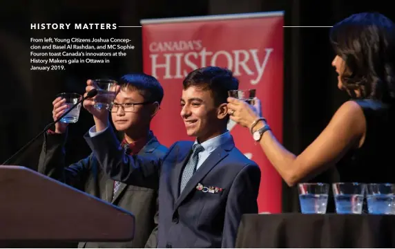  ??  ?? HISTORY MATTERS From left, Young Citizens Joshua Concepcion and Basel Al Rashdan, and MC Sophie Fouron toast Canada’s innovators at the History Makers gala in Ottawa in January 2019.