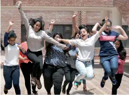  ?? — BIPLAB BANERJEE ?? Students celebrate their success in the CBSE Class 12 exams at a school in New Delhi on Sunday.