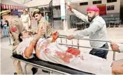  ?? PTI ?? A villager injured in a cross border firing by Pakistan being shifted to hospital in Jammu on Tuesday