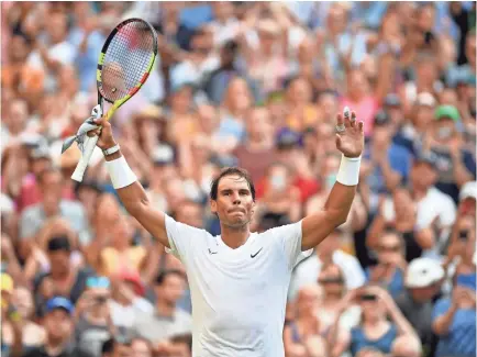  ?? GETTY IMAGES ?? Spain’s Rafael Nadal celebrates after his men’s singles victory against Australia’s Nick Kyrgios during Day 4 of the 2019 Wimbledon Championsh­ips.