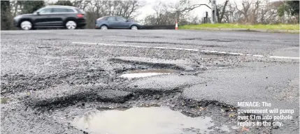  ??  ?? MENACE: The government will pump over £1m into pothole repairs in the city.