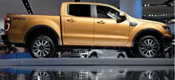  ?? ANDREW HARRER/BLOOMBERG ?? Ford 2019 Ranger is a mid-size truck that’s chock full of driver-assist technologi­es for highway or off-road trave.
