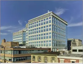  ?? ?? An exterior reskin project has been completed at the One Montgomery Plaza office building in Norristown. The upgrades include a brand new facade to correct for air and water infiltrati­on and replacemen­t of all windows with fixed pane thermal windows for energy efficiency.