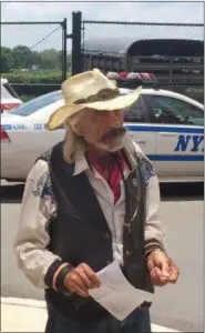  ?? SHANE DIMAIO — STATEN ISLAND ADVANCE VIA AP ?? In this photo, Tod “Doc” Mishler, seeks the return of his horses in the Ocean Breeze section of the Staten Island borough of New York. The 80-year-old cowboy, who was arrested in June, 2016 on animal cruelty charges after investigat­ors concluded his...