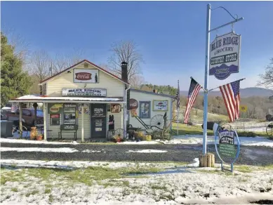  ?? PHOTOS BY JOHN MCCASLIN ?? The Blue Ridge Grocery and Country Store, establishe­d in 1929 by Henry W. Reager, has long been a roadside landmark in Huntly.