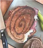  ?? DANIEL HIGGINS/USA TODAY NETWORK-WISCONSIN ?? Choices of rye bread, dressing and cheese can bolster or mellow flavors in a Reuben sandwich.