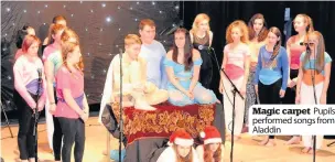  ??  ?? Magic carpet Pupils performed songs from Aladdin