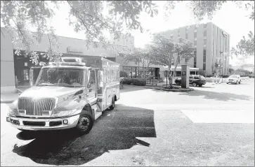  ?? STAN CARROLL/THE COMMERCIAL APPEAL FILES ?? An ambulance arrives at the emergency department with a Code 3 critical patient after a lights-and-sirens transport. For the medical team on duty, the question may arise: How much should be done to save this patient’s life?