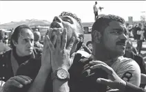  ?? AHMED
ABD EL- LATIF, EL SHOROUK NEWSPAPER/ THE ASSOCIATED PRESS ?? An anti-Mubarak protester reacts after hearing the verdict of the trial of the former Egyptian president on the outskirts of Cairo Saturday.