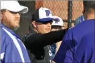  ?? BARRY TAGLIEBER — DIGITAL FIRST MEDIA ?? Phoenixvil­le head coach Neil Herman looks on from the dugout during a game a couple seasons ago. Herman’s Phantoms earned national recognitio­n, as the team was named a recipient of the ABCA Team Academic Excellence Award for the spring 2017 season.