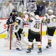  ?? (Reuters) ?? VEGAS GOLDEN KNIGHTS goaltender Marc-Andre Fleury (29) celebrates with teammates after defeating the Winnipeg Jets 2-1 in Sunday night’s series-clinching Game 5 of the Western Conference finals.