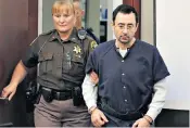  ??  ?? Guilty: disgraced former US Olympic gymnastics doctor Larry Nassar, below, was jailed for 175 years