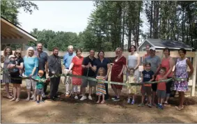  ?? SARATOGA COUNTY CHAMBER OF COMMERCE PHOTO ?? A ribbon-cutting ceremony is held to celebrate the grand opening of The Horsey Hostess in Saratoga.