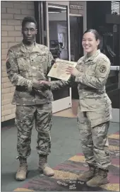  ?? ?? Cpl. Hannat Diaz Collazos is pictured alongside Staff Sgt. Ferris Lewis during her promotion ceremony in July. (Loaned photo)