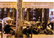  ?? AFP ?? A cafe in Paris in November 2015 after a series of terrorist attacks in the city that left more than 120 people dead