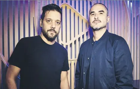  ??  ?? George Stroumboul­opoulos, left, joins Beats 1 DJ Zane Lowe in Apple Inc.’s Beats 1 studios. Stroumboul­opoulos kicked off the Canadian takeover series of Beats 1 Saturday, with other Canadians taking over the hosting duties at noon each Saturday in July.