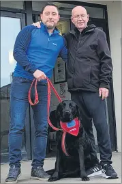  ?? ?? Cillian Bohane and John White pictured with April, the assistance dog, outside of CBS Secondary School.