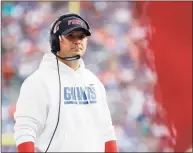  ?? Tim Nwachukwu / Getty Images ?? Giants coach Joe Judge watches Sunday’s game against the Broncos at MetLife Stadium in East Rutherford, New Jersey.