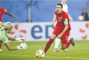  ?? FRANCISCO SECO/THE ASSOCIATED PRESS FILES ?? Christine Sinclair, right, has 183 internatio­nal goals, one behind Abby Wambach for the all-time record. Sinclair could break the record at the qualifying tournament.