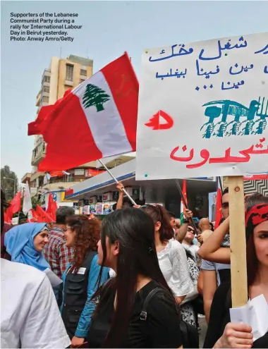  ??  ?? Supporters of the Lebanese Communist Party during a rally for Internatio­nal Labour Day in Beirut yesterday. Photo: Anway Amro/Getty