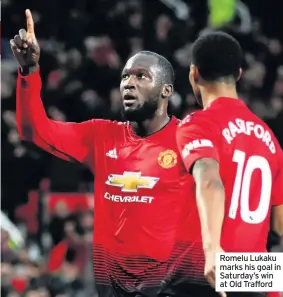  ??  ?? Romelu Lukaku marks his goal in Saturday’s win at Old Trafford