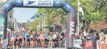  ??  ?? Competitor­s prepare to take the start of the Atlantic Airways Tórshavn Marathon in the city of Torshavn, on the Streymoy Island, the largest of Faroe Islands in this Atlantic ocean archipelag­o nation in this June 3 file photo. — AFP photo