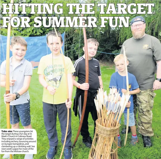  ??  ?? Take aim These youngsters hit the target during a fun day at St Mark’s Church in Coltness Road. They enjoyed a range of activities including archery, bouncing around on bungee trampoline­s, and clambering up a climbing wall. See next week’s paper for more of the fun from the Wishaw church.