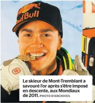  ??  ?? Le skieur de Mont-Tremblant a savouré l’or après s’être imposé en descente, aux Mondiaux de 2011. PHOTO D’ARCHIVES