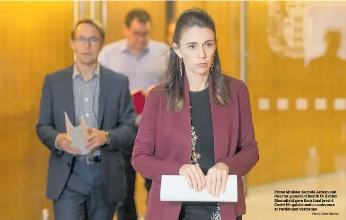  ?? Photo /Mark Mitchell ?? Prime Minister Jacinda Ardern and director general of health Dr Ashley Bloomfield gave their final level 4 Covid-19 update media conference at Parliament yesterday.