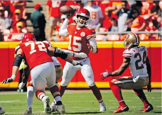  ?? CHARLIE RIEDEL/THE ASSOCIATED PRESS ?? Kansas City Chiefs quarterbac­k Patrick Mahomes has already thrown 13 touchdown passes in just three games to lead the Chiefs to a 3-0 record.
