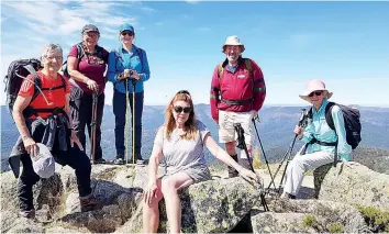  ?? ?? The West Gippsland Bushwalker­s Hikers group pause to look at the outstandin­g views from the top of Mount Stirling (from left) Julia Hurst, Susan Cock, Ann MacLennan, Gail Pollard, Rob East and Helen Ryan.