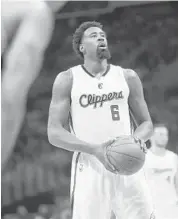  ?? STEPHEN DUNN/GETTY IMAGES ?? Clippers center DeAndre Jordan prepares to shoot a free throw after being intentiona­lly fouled in Game Five of the Western Conference quarterfin­als.