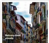  ??  ?? Balcony-lined streets