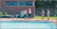  ?? NICHOLAS BUONANNO-NBUONANNO@TROYRECORD.COM ?? Fourteen-year-old Scott Shufelt jumps into Veterans Memorial Swimming Pool in Watervliet during its opening day Monday afternoon.