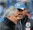  ?? FOTO: RTR ?? Nur einer lacht: David Wagner (hinten) und José Mourinho.