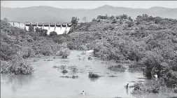  ?? -APP ?? A view of open spillways of Rawal Dam after increase water level due to recent monsoon rains.